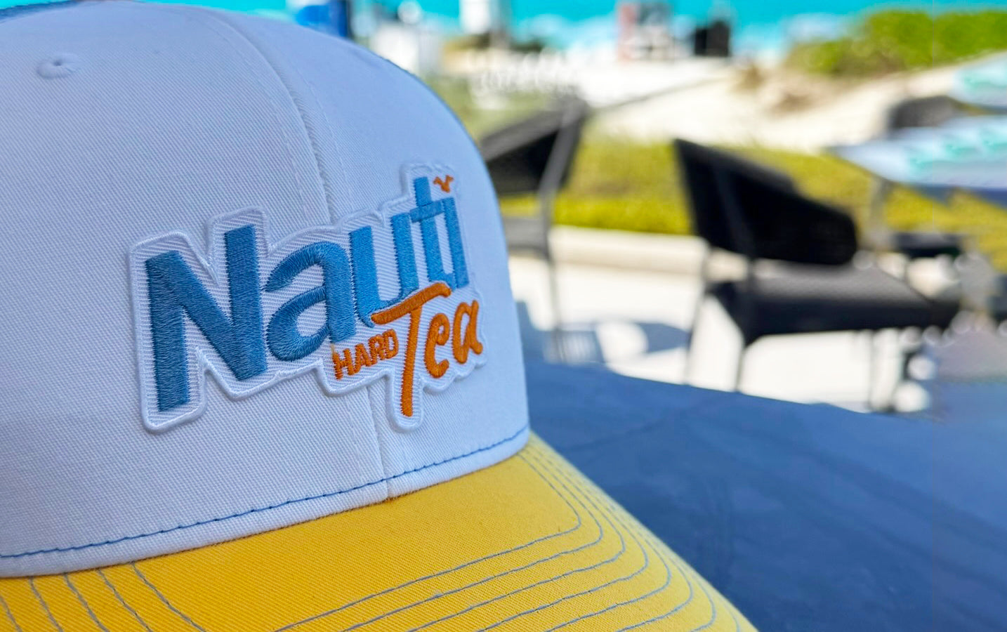Nauti Tea© Richardson 112 Patch Trucker Hat – White/Yellow/Blue